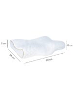 biała poduszka o falistym kształcie na neutralnym tle