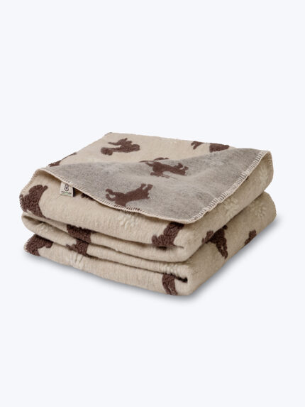 Koc wełniany ecru z brązowym wzorem na neutralnym tle